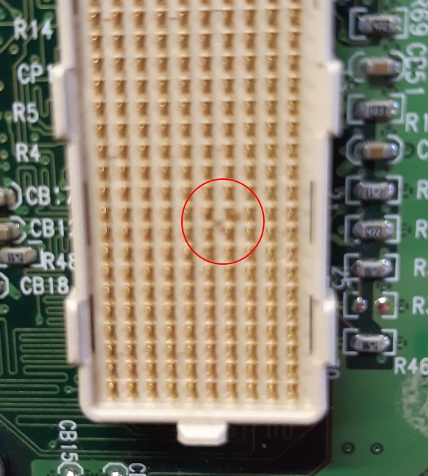 The red circle shows the condition after the repair.